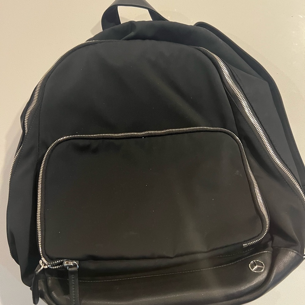 Sleek Black Backpack with Silver Accents